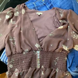 Cropped Dress Shirt Size M, almost like a mauve color with floral print.